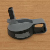 Black and gray plastic Kids Tumbler lis with straw on wood surface