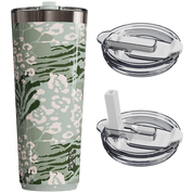Tumbler with camouflage pattern, clear lid, and straw on a white background