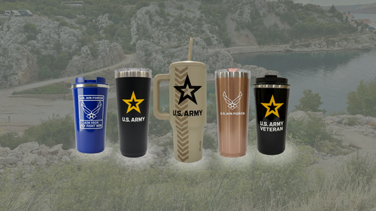 Set of U.S.military licensed tumblers with various designs against a scenic background.