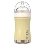 Yellow baby bottle with a clear lid on a white background