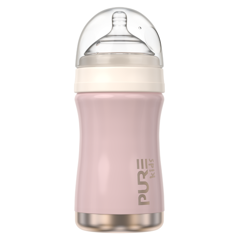 Pink baby bottle with clear lid on a white background
