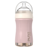 Pink baby bottle with clear lid on a white background